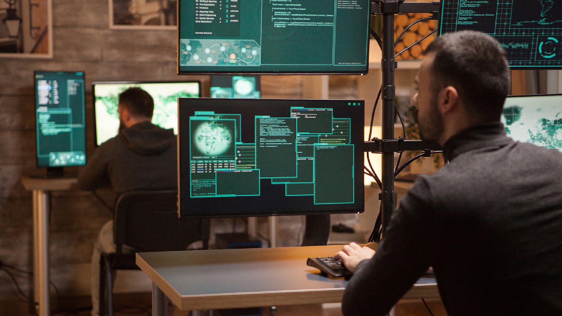 back-view-dangerous-team-hackers-working-new-malware-1